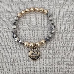 Avon Elastic Libra Charm Bracelet- NWOT